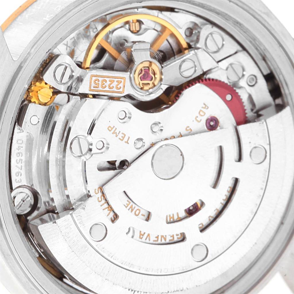 This image shows a close-up view of the movement and internal mechanism of the Rolex Datejust 79173 Women's Steel and Gold (two tone) White Dial 79173 Women's Steel and Gold (two tone) White Dial watch.