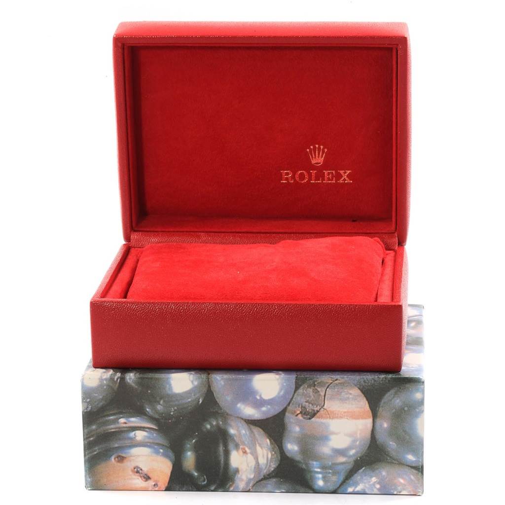 The image shows an open red box for the Rolex Datejust 79173 Women's Steel and Gold (two tone) White Dial 79173 Women's Steel and Gold (two tone) White Dial watch, featuring the brand's logo on the interior lid.