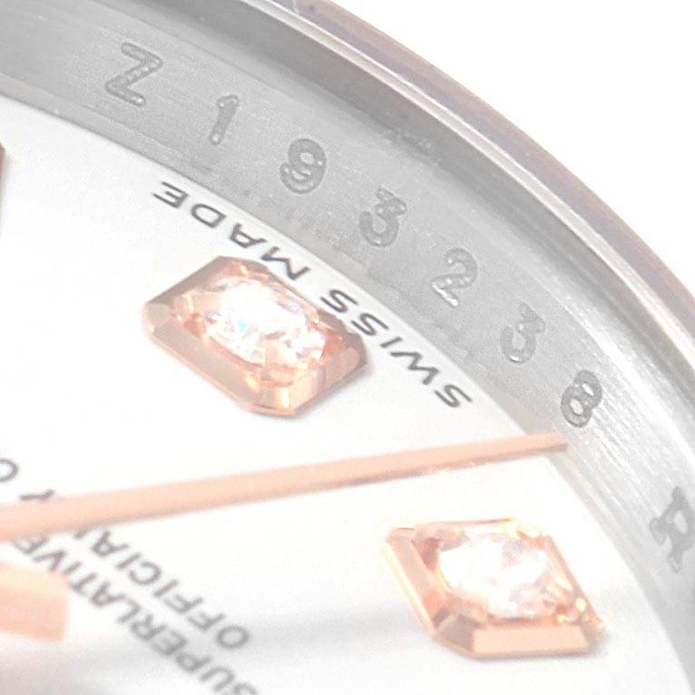 The image shows a close-up of the dial of a Rolex Datejust 179161 Women's Steel and Gold (two tone) White Dial 179161 Women's Steel and Gold (two tone) White Dial watch, highlighting the index markers and part of the bezel.