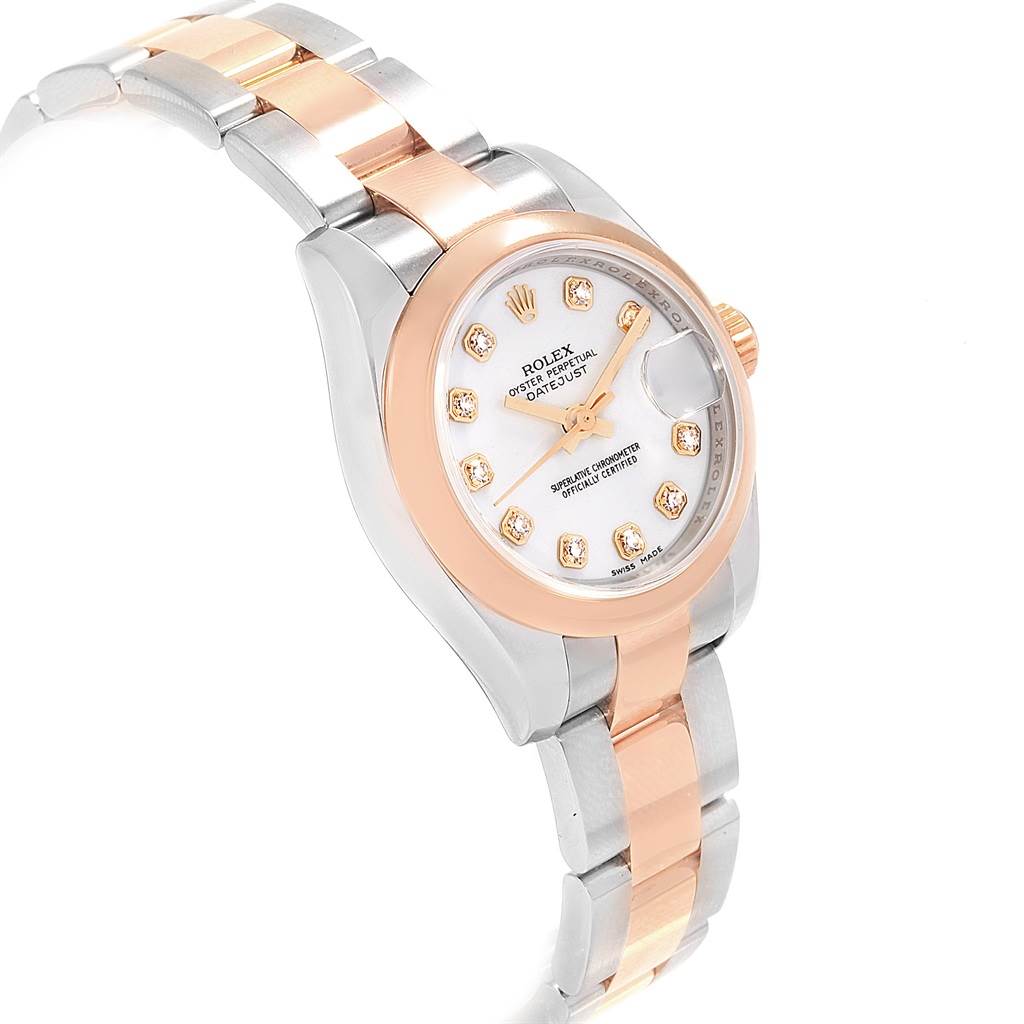 The image shows a Rolex Datejust 179161 Women's Steel and Gold (two tone) White Dial 179161 Women's Steel and Gold (two tone) White Dial watch at an angled view, highlighting its bracelet, bezel, and diamond markers on the dial.