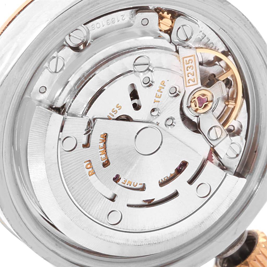 This is a close-up image of the Rolex Datejust 179161 Women's Steel and Gold (two tone) White Dial 179161 Women's Steel and Gold (two tone) White Dial watch movement, showcasing its intricate mechanical components.