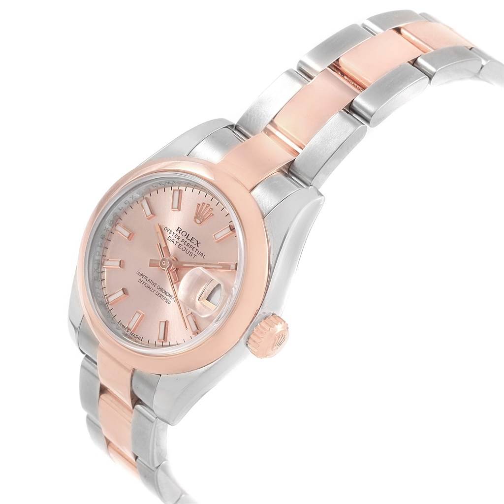The Rolex Datejust 179161 Women's Steel and Gold (two tone) Pink Dial 179161 Women's Steel and Gold (two tone) Pink Dial watch is shown at a slight angle, highlighting the dial, bezel, bracelet, and crown.
