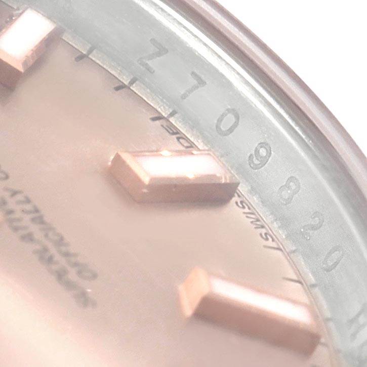 This image shows a close-up angle of the Datejust model by Rolex, focusing on the dial and part of the rehaut with engraved serial numbers.