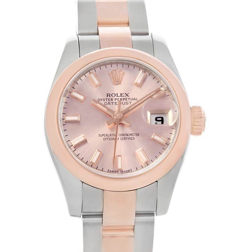 The image shows a front angle of a Rolex Datejust 179161 Women's Steel and Gold (two tone) Pink Dial 179161 Women's Steel and Gold (two tone) Pink Dial watch, featuring the dial, hands, date window, and part of the bracelet.