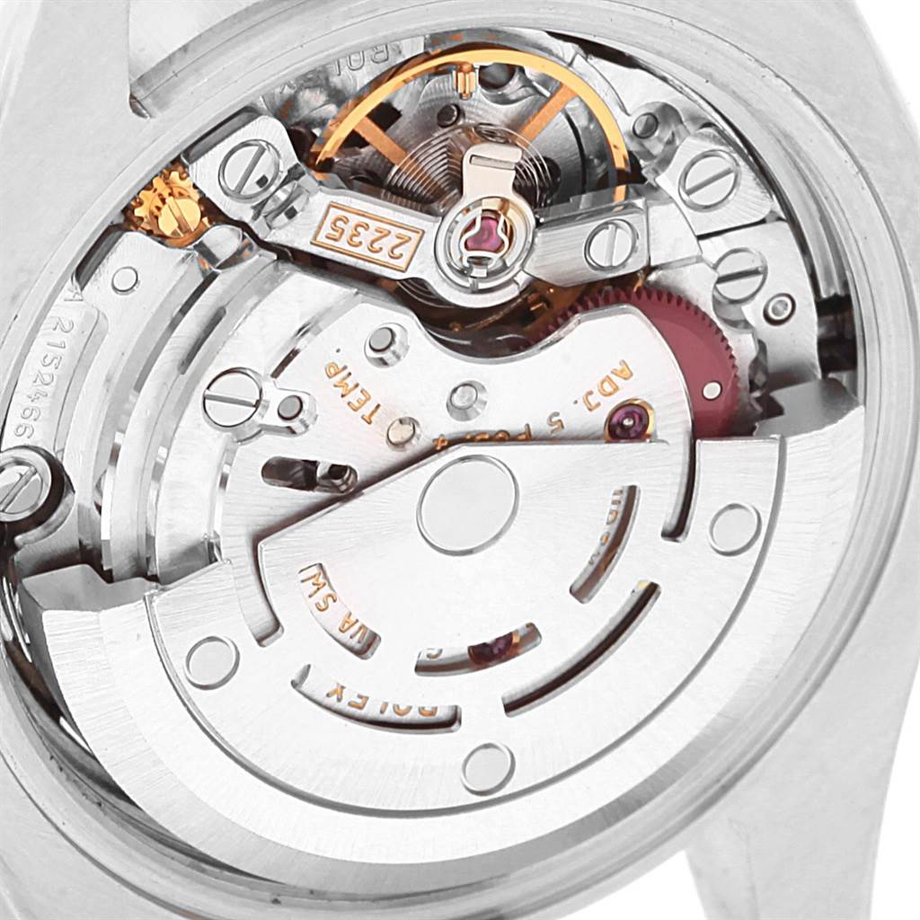 Close-up view of the movement inside a Rolex Datejust 179163 Women's Steel and Gold (two tone) White Dial 179163 Women's Steel and Gold (two tone) White Dial watch, showing intricate gears and mechanisms.