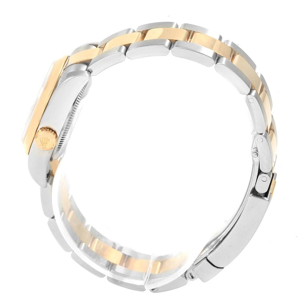 The image shows a side view of the Rolex Datejust 179163 Women's Steel and Gold (two tone) White Dial 179163 Women's Steel and Gold (two tone) White Dial watch, focusing on the bracelet and crown.