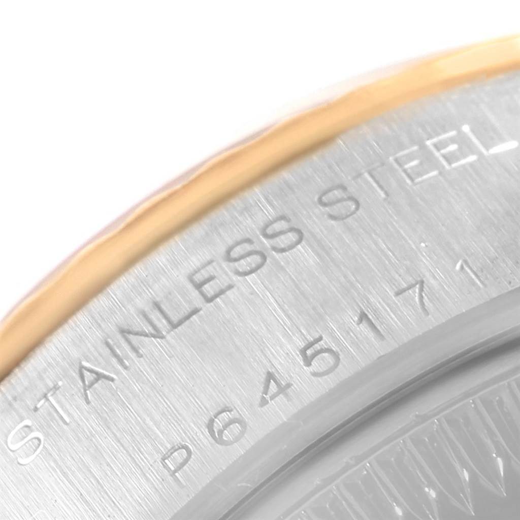 This close-up image shows the stainless steel case back of a Rolex Datejust 79173 Women's Steel and Gold (two tone) Grey Dial 79173 Women's Steel and Gold (two tone) Grey Dial watch.