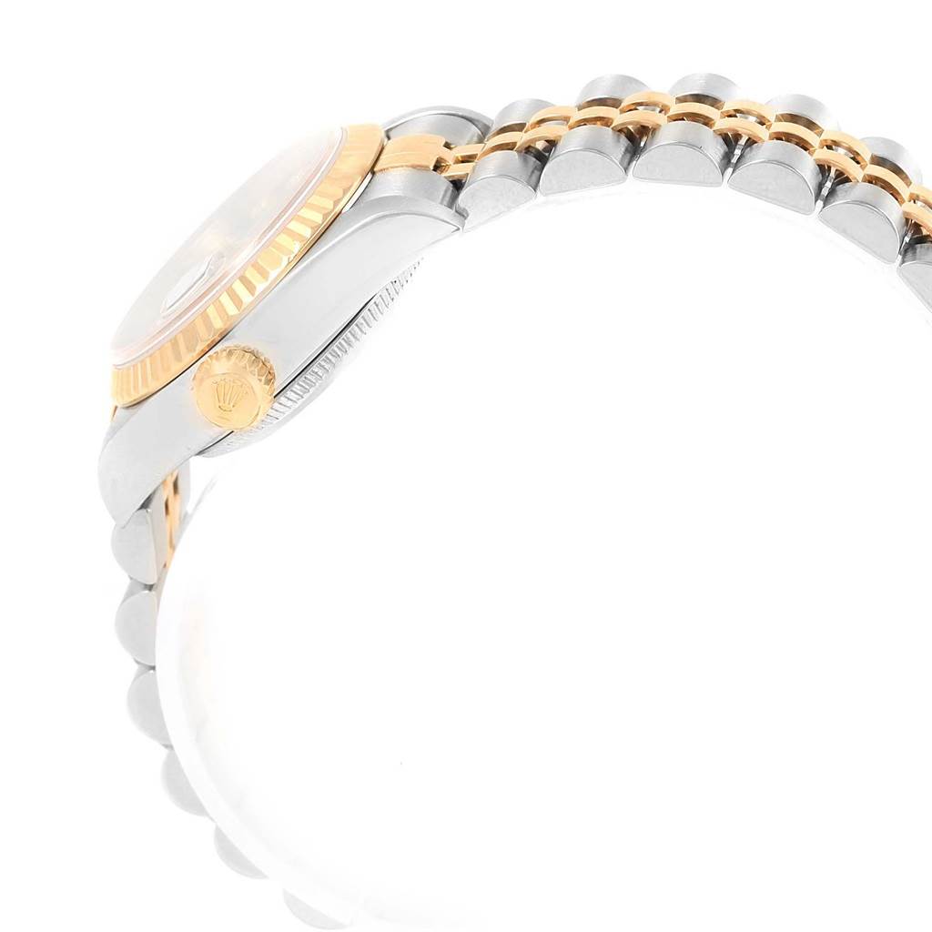 The image shows a side view of the Rolex Datejust 79173 Women's Steel and Gold (two tone) Grey Dial 79173 Women's Steel and Gold (two tone) Grey Dial watch, highlighting its crown, bezel, and part of the bracelet.