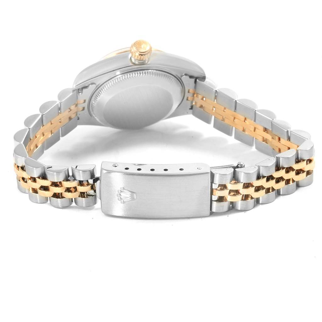 The image shows the backside of a Rolex Datejust 79173 Women's Steel and Gold (two tone) Grey Dial 79173 Women's Steel and Gold (two tone) Grey Dial watch focusing on the clasp and bracelet.