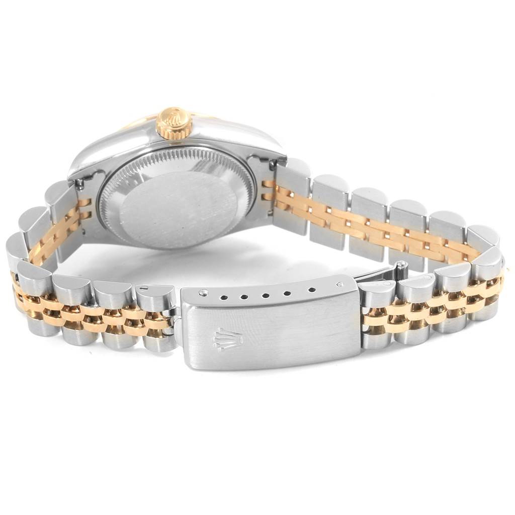 The image shows the back view of a Rolex Datejust 69173 Women's Stainless Steel White Dial 69173 Women's Stainless Steel White Dial watch highlighting its two-tone metal bracelet and clasp.