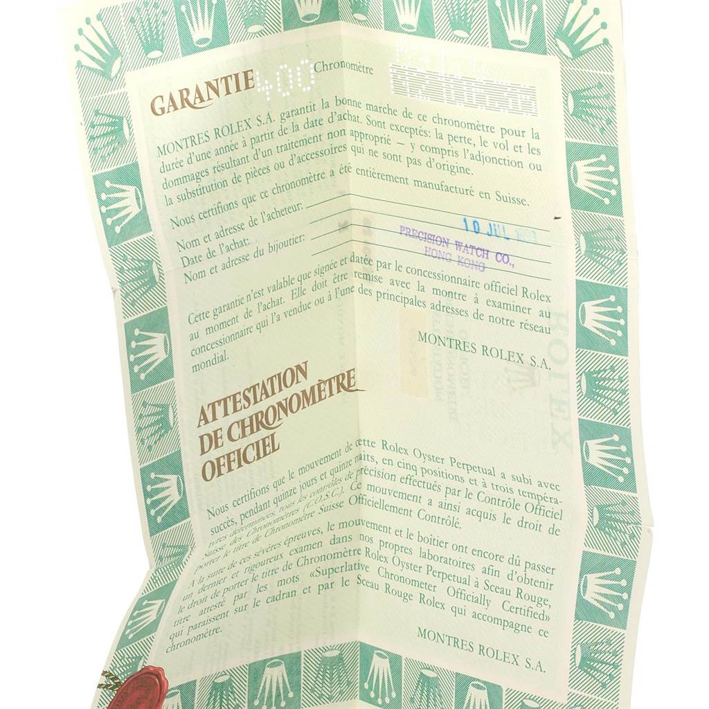 The image shows a folded official certificate for a Rolex Datejust 69174 Women's Stainless Steel Silver Dial 69174 Women's Stainless Steel Silver Dial watch, displaying a guarantee and chronometer attestation.