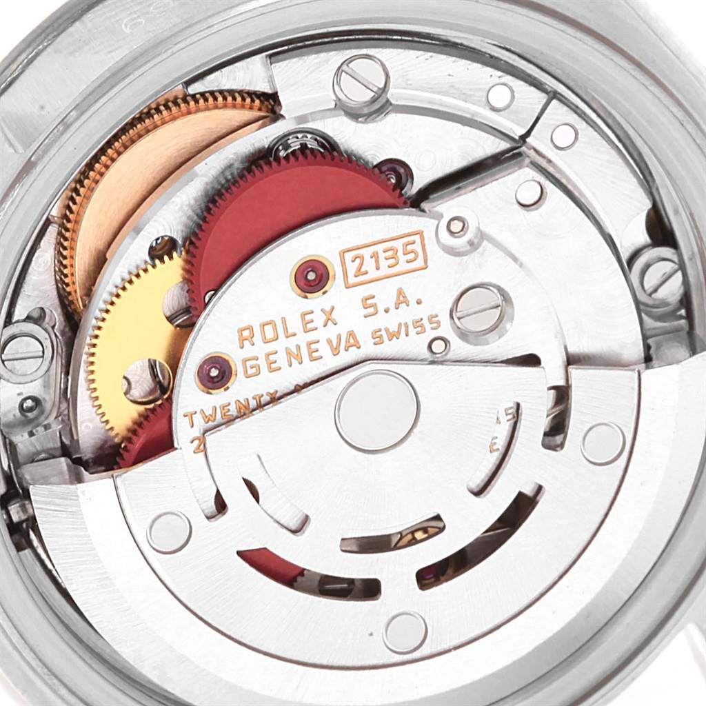 This close-up image shows the intricate internal movement mechanism of a Rolex Datejust 69174 Women's Stainless Steel Silver Dial 69174 Women's Stainless Steel Silver Dial model.
