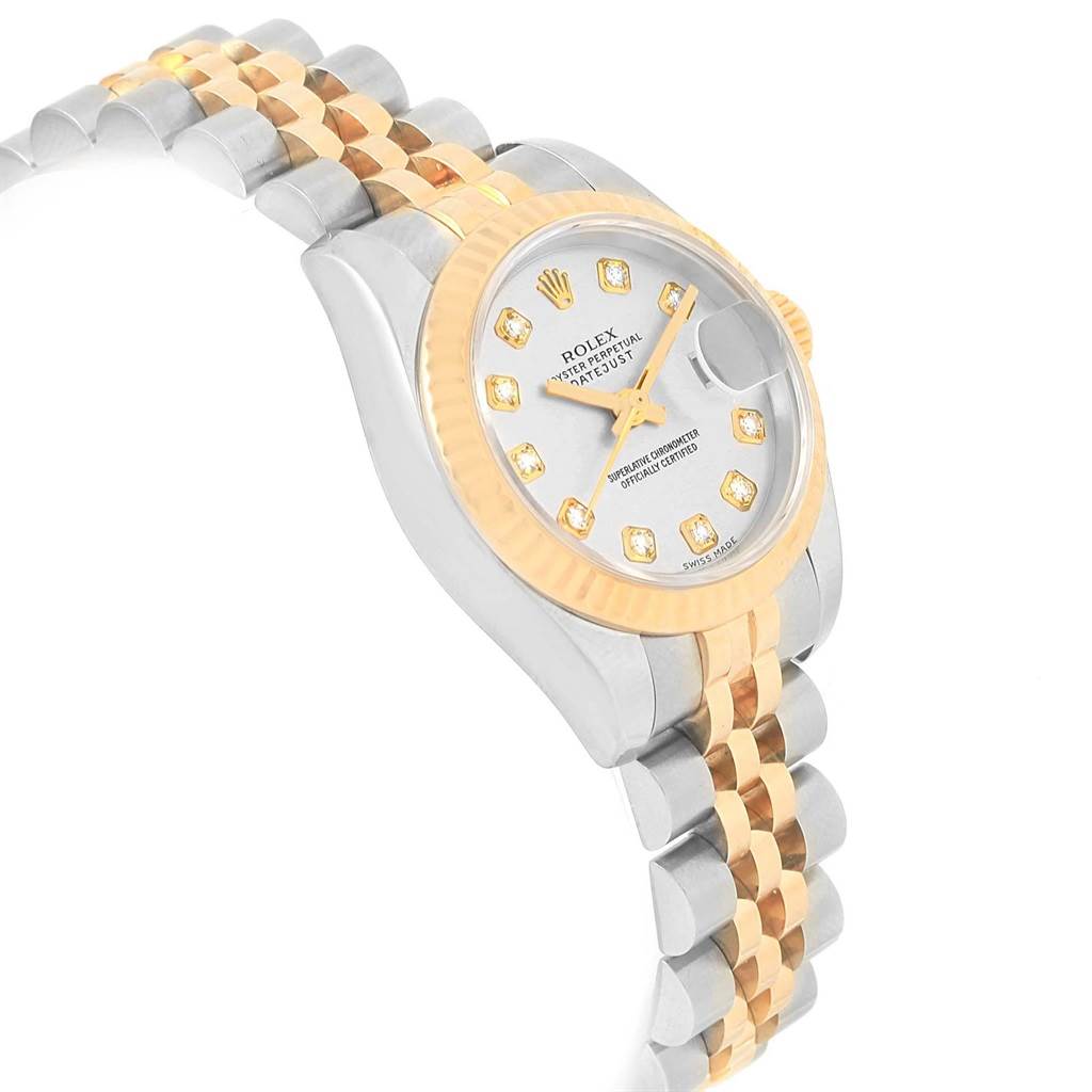 This Rolex Datejust 179173 Women's Steel and Gold (two tone) Silver Dial 179173 Women's Steel and Gold (two tone) Silver Dial watch is shown at a slight angle, highlighting its two-tone Jubilee bracelet, fluted bezel, and diamond hour markers.