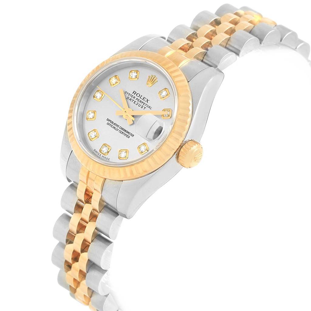 The image shows a side angle of a Rolex Datejust 179173 Women's Steel and Gold (two tone) Silver Dial 179173 Women's Steel and Gold (two tone) Silver Dial watch, highlighting its two-tone bracelet, case, and diamond-set dial.