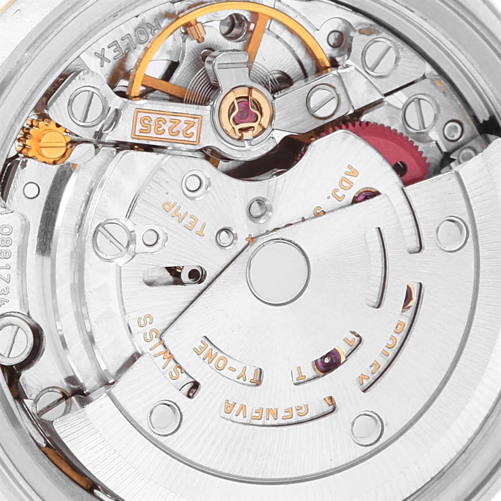 This is a close-up view of the Rolex Datejust 79173 Women's Steel and Gold (two tone) White Dial 79173 Women's Steel and Gold (two tone) White Dial movement, showcasing the intricate internal mechanics and details.