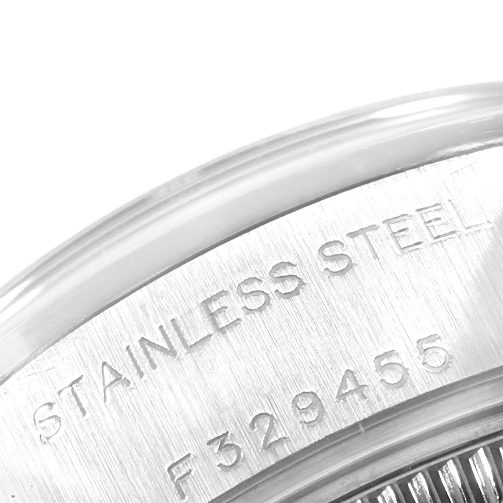 The image shows a close-up view of the stainless steel case back with engraved details of a Rolex Datejust 79160 Women's Stainless Steel White Dial 79160 Women's Stainless Steel White Dial model.