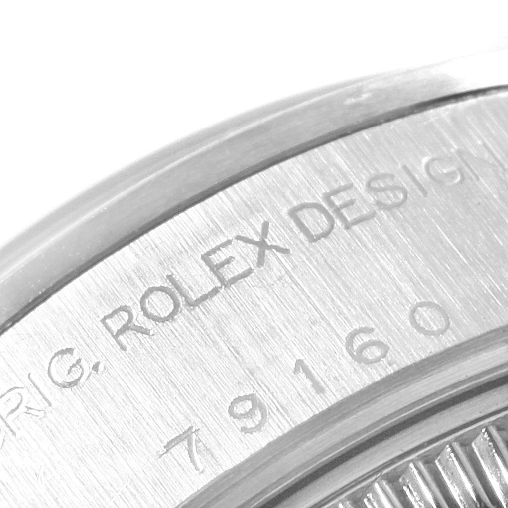 The image shows a close-up of the side of the case of a Rolex Datejust 79160 Women's Stainless Steel White Dial 79160 Women's Stainless Steel White Dial watch.