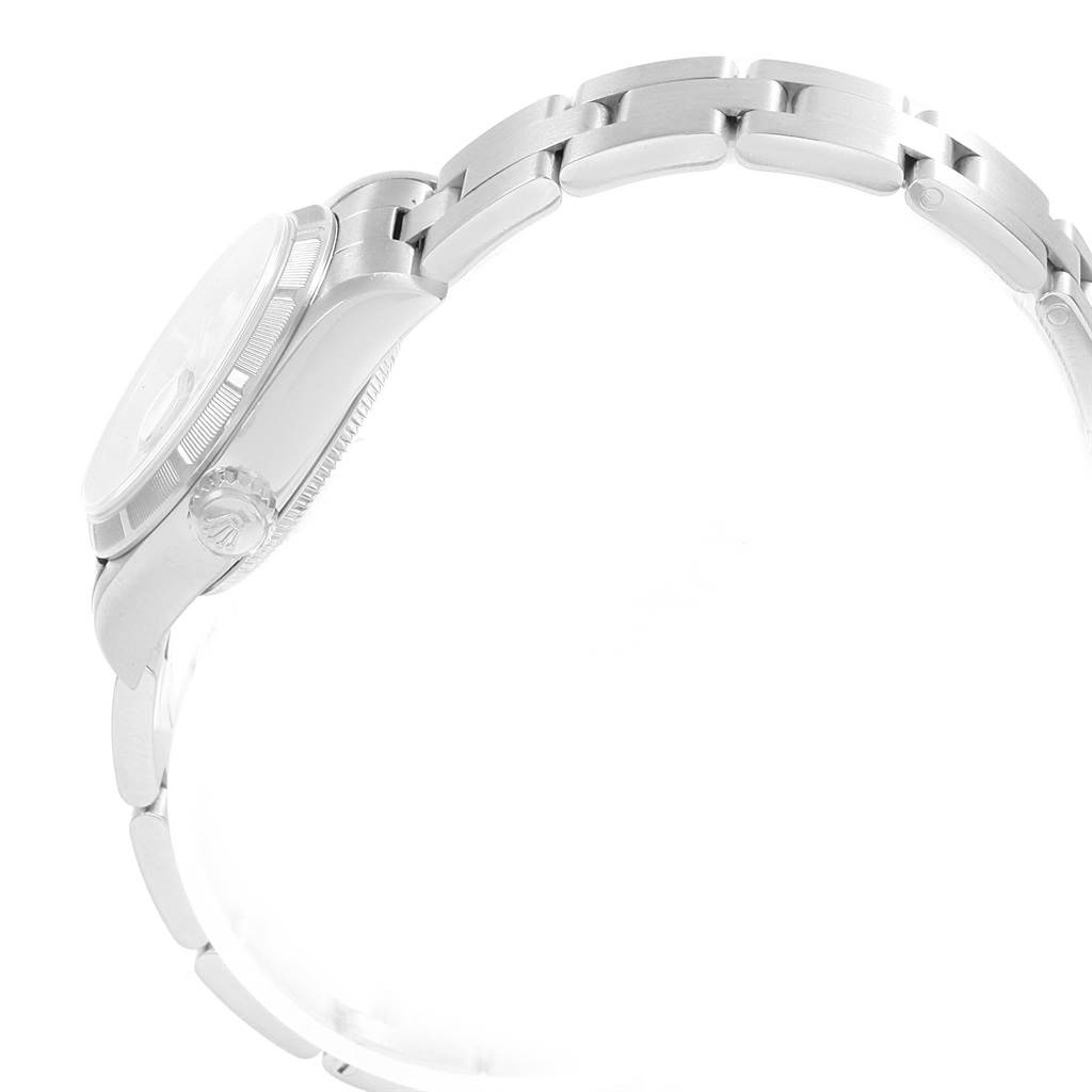 The image shows a side view of the Rolex Datejust 79190 Women's Stainless Steel White Dial 79190 Women's Stainless Steel White Dial watch, highlighting the crown, case, and bracelet.