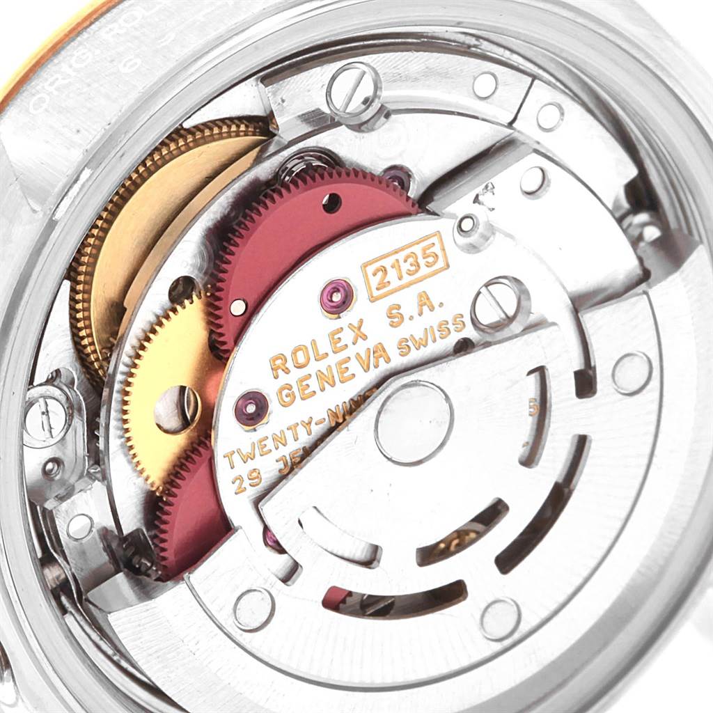 This is a close-up of the Rolex Datejust 69173 Women's Stainless Steel White Dial 69173 Women's Stainless Steel White Dial watch movement, showing intricate internal components.