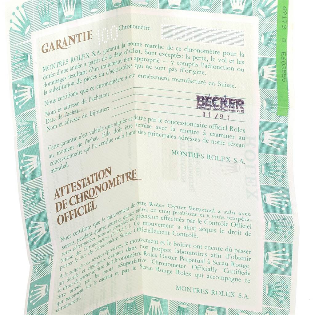 This image shows the warranty and certificate documents for a Rolex Datejust 69173 Women
s Stainless Steel Beige Dial 69173 Women
s Stainless Steel Beige Dial watch.