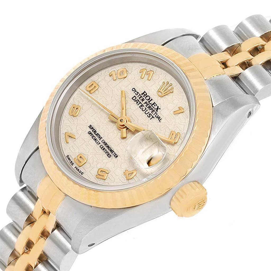 This image shows a close-up, angled view of the face, bezel, crown, and part of the bracelet of a Rolex Datejust 69173 Women
s Stainless Steel Beige Dial 69173 Women
s Stainless Steel Beige Dial watch.