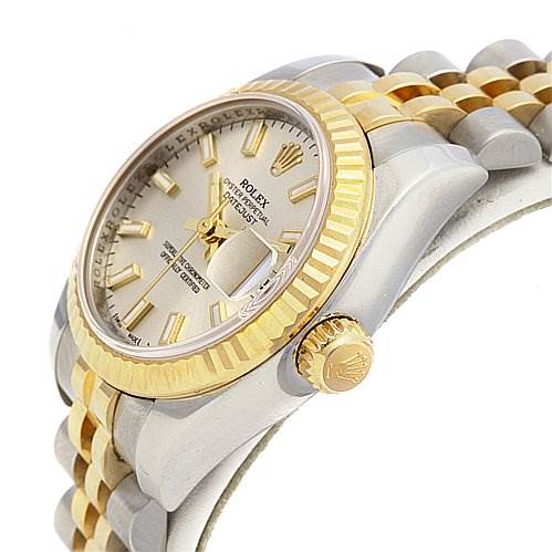 This image shows the side angle of a Rolex Datejust 179173 Women's Stainless Steel White Dial 179173 Women's Stainless Steel White Dial watch, highlighting the crown, fluted bezel, and part of the Jubilee bracelet.