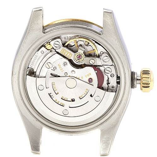 The image shows the movement mechanism of a Rolex Datejust 179173 Women's Stainless Steel White Dial 179173 Women's Stainless Steel White Dial watch from the back, revealing its intricate internal components.