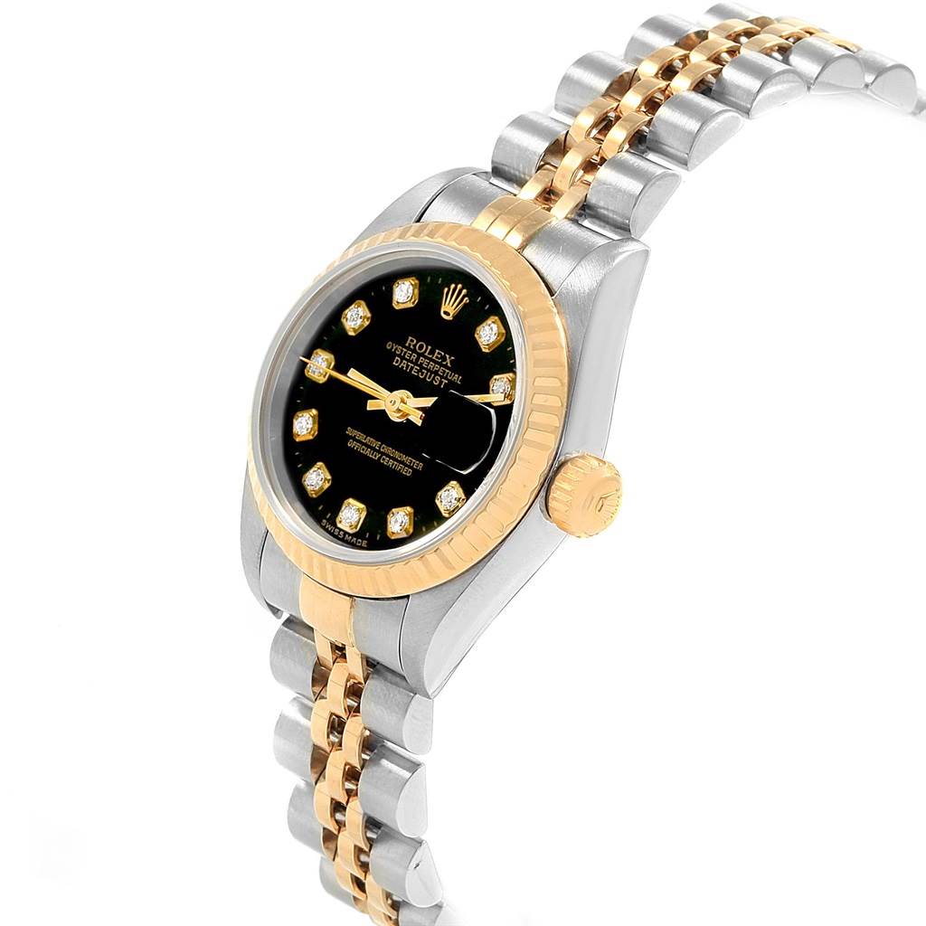 The image shows an angled view of a Rolex Datejust 69173 Women's Stainless Steel Black Dial 69173 Women's Stainless Steel Black Dial watch, highlighting the face, bezel, crown, and part of the bracelet.