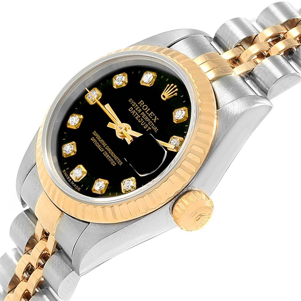 The image shows a close-up of the Rolex Datejust 69173 Women's Stainless Steel Black Dial 69173 Women's Stainless Steel Black Dial watch's face, crown, and part of the two-tone bracelet at an angled view.