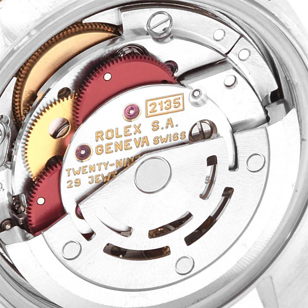 This image shows the intricate internal mechanism of a Rolex Datejust 69173 Women's Stainless Steel Black Dial 69173 Women's Stainless Steel Black Dial watch, focusing on the movement parts.