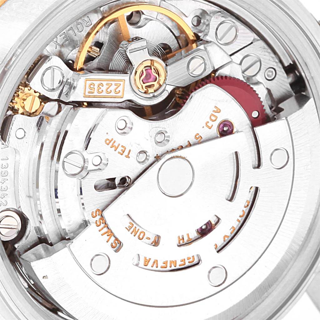 This image shows a close-up view of the movement mechanism of a Rolex Datejust 79163 Women's Steel and Gold (two tone) Silver Dial 79163 Women's Steel and Gold (two tone) Silver Dial watch.
