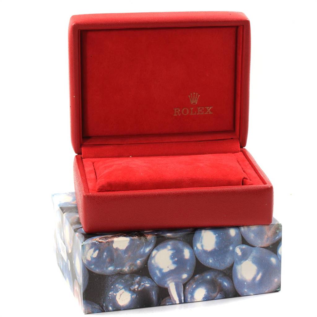 This image shows the red presentation box for the Rolex Datejust 79163 Women's Steel and Gold (two tone) Silver Dial 79163 Women's Steel and Gold (two tone) Silver Dial model, with the lid open and displaying the brand logo inside.