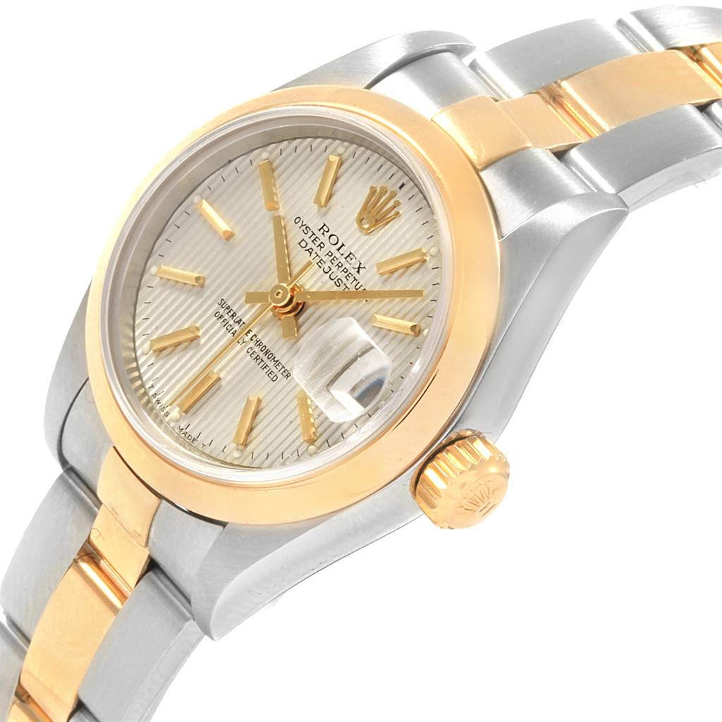 This image shows a close-up side angle of the Rolex Datejust 79163 Women's Steel and Gold (two tone) Silver Dial 79163 Women's Steel and Gold (two tone) Silver Dial watch, highlighting its two-tone bracelet, bezel, dial, and crown.