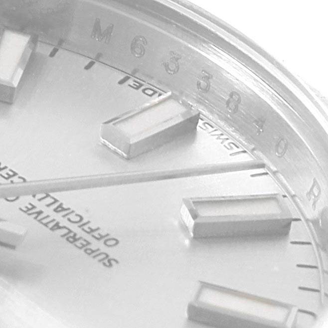 This close-up image of a Rolex Datejust 179160 Women's Stainless Steel Silver Dial 179160 Women's Stainless Steel Silver Dial watch shows part of the dial and stainless steel markers.