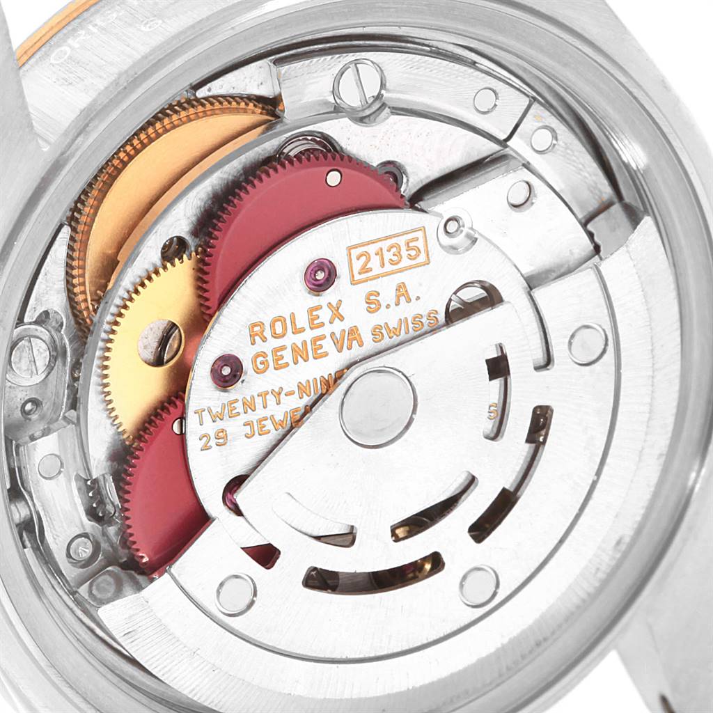 This image shows a close-up view of the movement and internal mechanics of a Rolex Datejust 69163 Women's Steel and Gold (two tone) White Dial 69163 Women's Steel and Gold (two tone) White Dial watch.