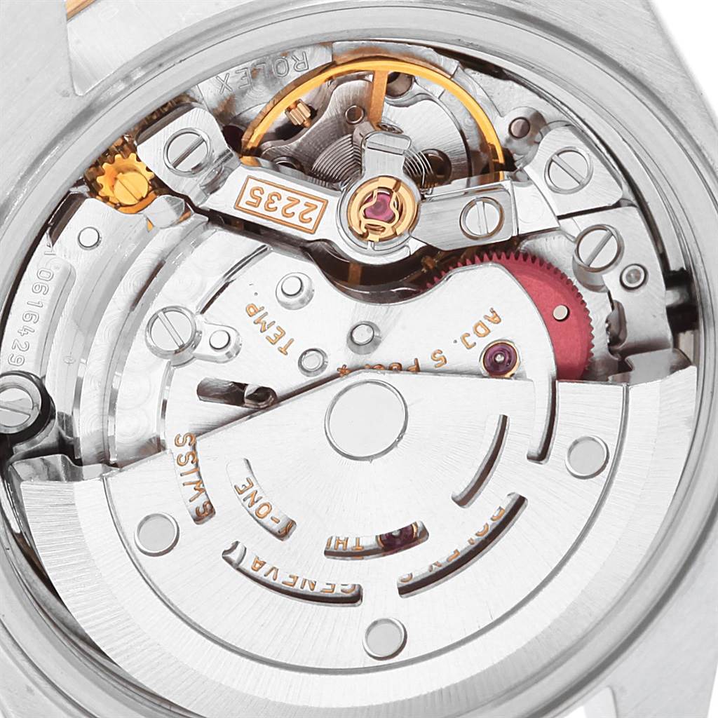 The image shows a close-up view of the movement and internal components of a Rolex Datejust 79163 Women's Steel and Gold (two tone) Champagne Dial 79163 Women's Steel and Gold (two tone) Champagne Dial watch.
