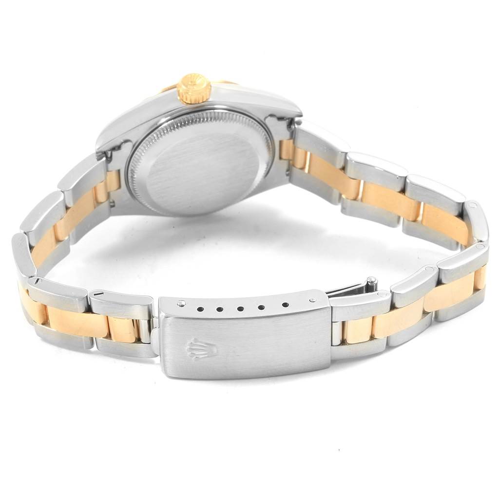 The image shows the back view of a Rolex Datejust 79163 Women's Steel and Gold (two tone) Champagne Dial 79163 Women's Steel and Gold (two tone) Champagne Dial watch, highlighting its case back, crown, and two-tone bracelet with clasp.