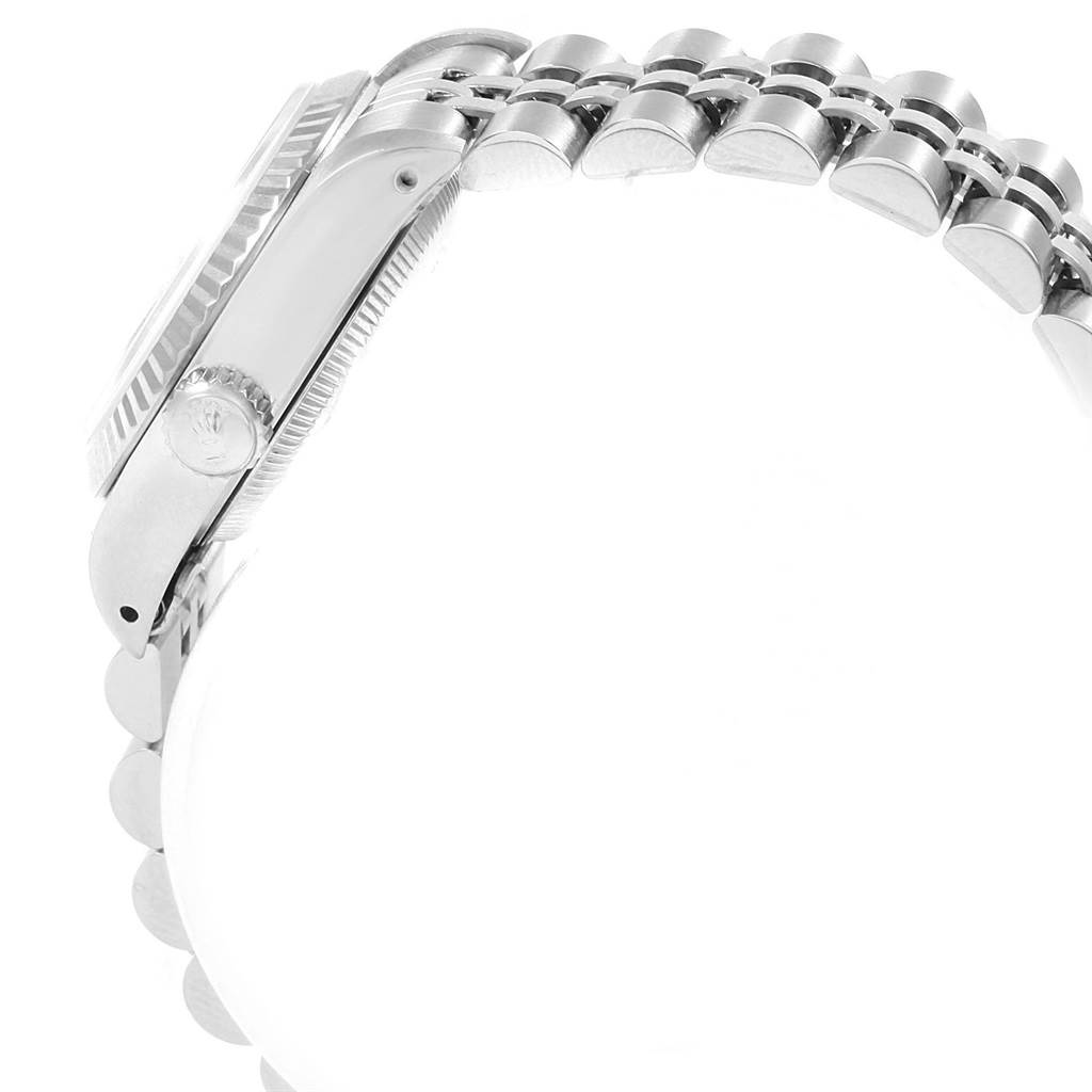 The image shows a side view of the Rolex Datejust 69174 Women's Stainless Steel Silver Dial 69174 Women's Stainless Steel Silver Dial watch, highlighting the crown, case, and bracelet.