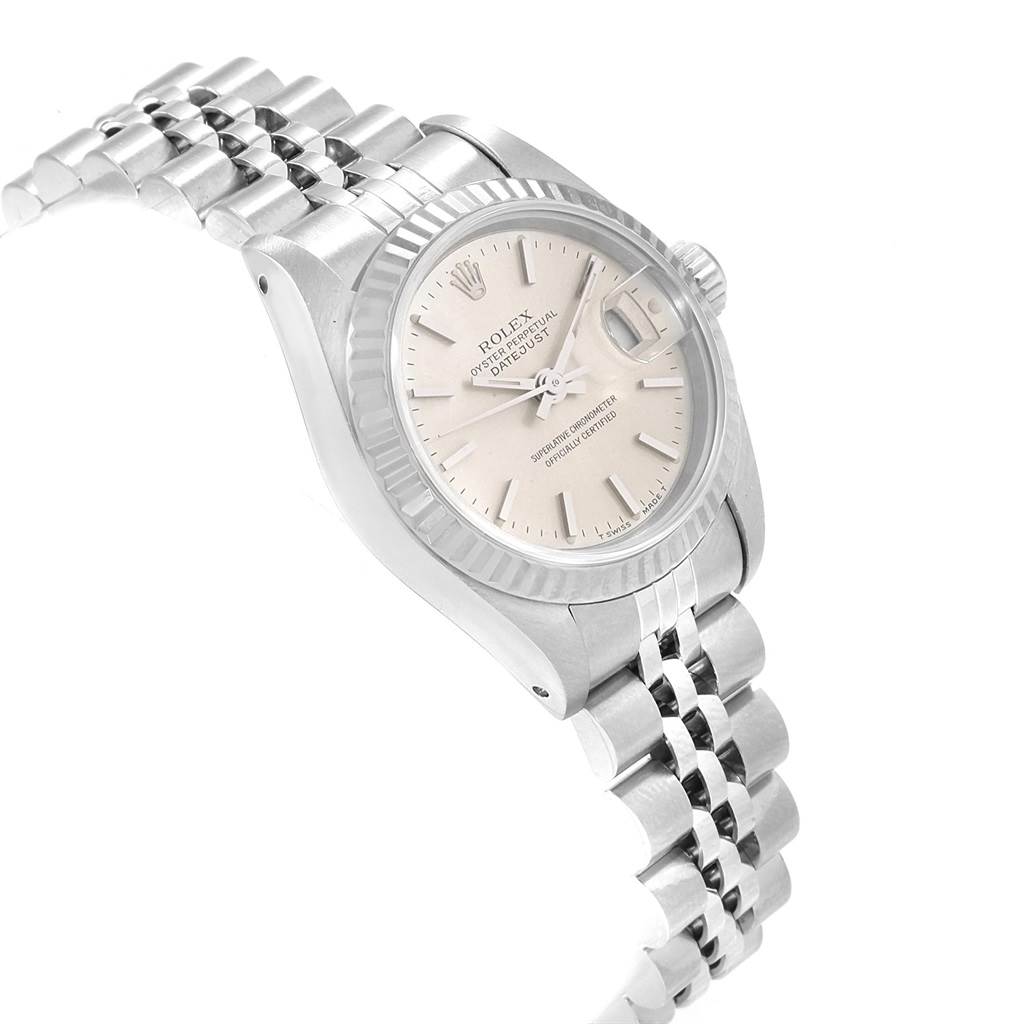 The image shows a side angle view of a Rolex Datejust 69174 Women's Stainless Steel Silver Dial 69174 Women's Stainless Steel Silver Dial watch, highlighting the watch face, bezel, crown, and part of the bracelet.