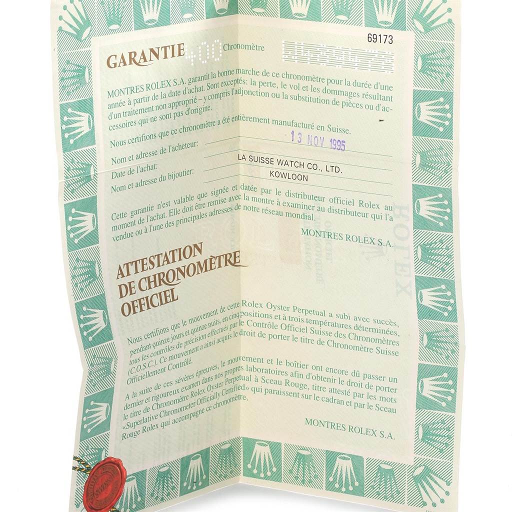 This image shows the warranty and certification documents for a Rolex Datejust 69173 Women's Stainless Steel Beige Dial 69173 Women's Stainless Steel Beige Dial watch.