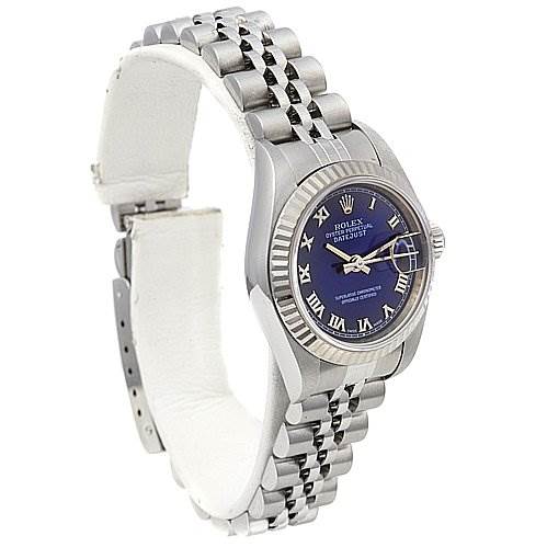 The image shows a side angle of a Rolex Datejust 79174 Women's Stainless Steel Blue Dial 79174 Women's Stainless Steel Blue Dial watch, highlighting its bracelet, case, and blue dial with Roman numerals.