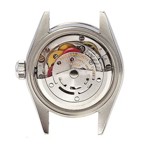 The image shows the back view of a Rolex Datejust 79174 Women's Stainless Steel Blue Dial 79174 Women's Stainless Steel Blue Dial watch, revealing its internal mechanical movements and components.