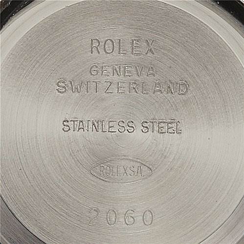 This image shows the back case of a Rolex Datejust 79174 Women's Stainless Steel Blue Dial 79174 Women's Stainless Steel Blue Dial watch, featuring engravings of the brand, origin, material, and the number 2060.