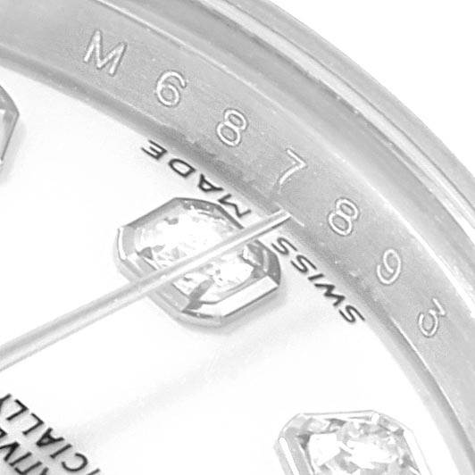 This close-up image shows the dial, diamond markers, and part of the second hand of a Rolex Datejust 179174 Women
s Stainless Steel White Dial 179174 Women
s Stainless Steel White Dial watch.