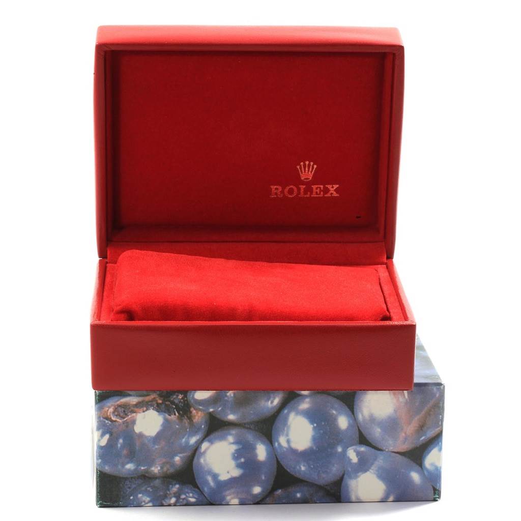 This image shows a Rolex Datejust 69173 Women's Stainless Steel White Dial 69173 Women's Stainless Steel White Dial watch box and cushion from a front angle.