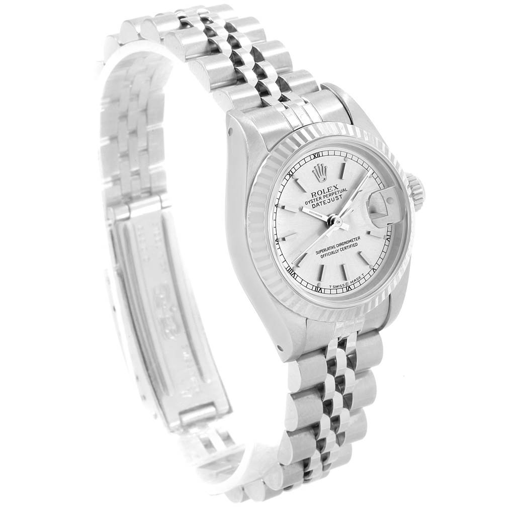 The image shows an angled view of a Rolex Datejust 69174 Women's Stainless Steel Silver Dial 69174 Women's Stainless Steel Silver Dial watch, highlighting its dial, bezel, and jubilee bracelet.