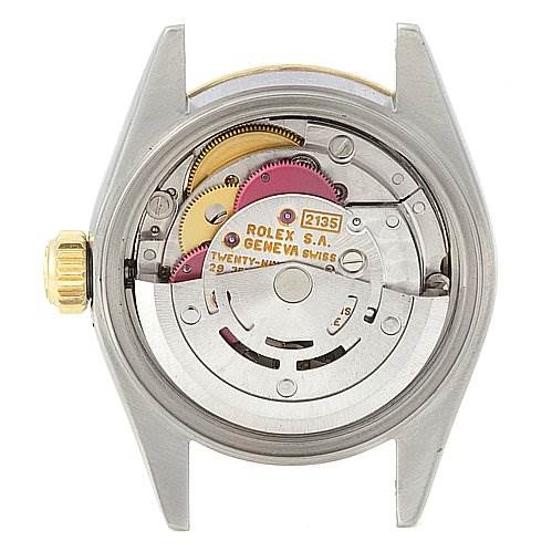 The image shows the inner mechanism of a Rolex Datejust 69173 Women's Stainless Steel Silver Dial 69173 Women's Stainless Steel Silver Dial watch from a back view, displaying its gears and movement parts.