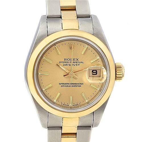 The image shows a front view of a Rolex Datejust 79163 Women's Yellow Gold Champagne Dial 79163 Women's Yellow Gold Champagne Dial watch, highlighting its gold and silver bracelet, champagne dial, and date display.