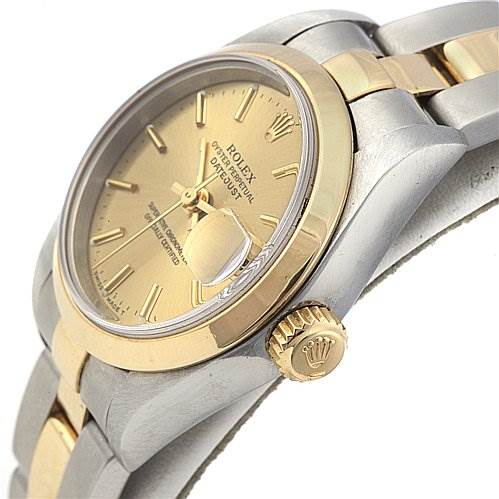 The image shows the side angle of a Rolex Datejust 79163 Women's Yellow Gold Champagne Dial 79163 Women's Yellow Gold Champagne Dial, highlighting the dial, crown, and part of the bracelet.