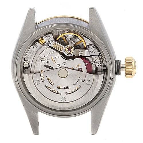 This image shows the back view of a Rolex Datejust 79163 Women's Yellow Gold Champagne Dial 79163 Women's Yellow Gold Champagne Dial watch case, revealing its mechanical movement components.